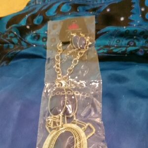 Gold-Tone Necklace with Purple Accent Pendant